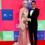 Susan Carland Instagram – Hello from LA! So great to attend the G’day USA gala hosted by the AAA last night, where Waleed was MC! It’s a night that celebrates the relationship between the arts industries in Aus and the US, and one of the highlights of the night was when they brought out piles of Tim Tams to every table. Now friends, I don’t want to alarm anyone but I noticed at the end of the night that someone (can only have been an American, as no Australian would ever) had taken one bite of the Tim Tam and LEFT THE REST ON THE TABLE. This can only be seen as an act of aggression and possibly war from what was once a great ally and I’m sure urgent talks are under way.
ANYWAY. My dress is by none other than @aleemyusufcouture, make up was by @giigiisbeauty and in that last picture? You see me gazing absolutely adoringly at my husband. I know. Too much 🤷‍♀️ Los Angeles, California