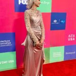 Susan Carland Instagram - Hello from LA! So great to attend the G’day USA gala hosted by the AAA last night, where Waleed was MC! It’s a night that celebrates the relationship between the arts industries in Aus and the US, and one of the highlights of the night was when they brought out piles of Tim Tams to every table. Now friends, I don’t want to alarm anyone but I noticed at the end of the night that someone (can only have been an American, as no Australian would ever) had taken one bite of the Tim Tam and LEFT THE REST ON THE TABLE. This can only be seen as an act of aggression and possibly war from what was once a great ally and I’m sure urgent talks are under way. ANYWAY. My dress is by none other than @aleemyusufcouture, make up was by @giigiisbeauty and in that last picture? You see me gazing absolutely adoringly at my husband. I know. Too much 🤷‍♀️ Los Angeles, California