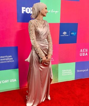 Susan Carland Instagram - Hello from LA! So great to attend the G’day USA gala hosted by the AAA last night, where Waleed was MC! It’s a night that celebrates the relationship between the arts industries in Aus and the US, and one of the highlights of the night was when they brought out piles of Tim Tams to every table. Now friends, I don’t want to alarm anyone but I noticed at the end of the night that someone (can only have been an American, as no Australian would ever) had taken one bite of the Tim Tam and LEFT THE REST ON THE TABLE. This can only be seen as an act of aggression and possibly war from what was once a great ally and I’m sure urgent talks are under way.
ANYWAY. My dress is by none other than @aleemyusufcouture, make up was by @giigiisbeauty and in that last picture? You see me gazing absolutely adoringly at my husband. I know. Too much 🤷‍♀️