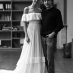 Taylor Hill Instagram - @taylor_hill and her now husband Daniel Fryer got engaged in June of 2021 when Daniel proposed with a three-stone emerald cut diamond engagement ring while the couple was on vacation in Italy. After the engagement—but before the bride made the trip home to Winter Park, Colorado get married—Vogue caught up with Taylor for her final wedding dress fitting in Manhattan with @etro creative director @marcodevincenzo. “This is [actually] the first wedding dress that Etro has ever made!” Taylor shares. The model has been working with #Etro for nearly a decade, so when she began thinking about who she wanted to make her wedding dress, it just made sense. “When they sent me the sketches of it, I was like, ‘It’s like you’re in my head,’” she remembers. “My favorite part of the dress is probably the top and the sleeve. It gives it the element of romance that I was looking for.” Tap the link in our bio to go behind the scenes of her final wedding dress fitting at #Etro. Photos: @lucabroilo