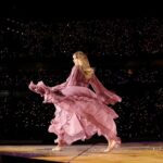 Taylor Swift Instagram – It was a Speak Now (my version) album release party at Arrowhead Stadium in Kansas City this weekend, full of surprises 😆 I got to premiere the video for ‘I Can See You’ on the big screen and hearing the crowd’s reaction to it is something I’ll never forget. THEN @joeyking @taylorlautner and @helloimpresleycash walked on stage (and there were even a few flips??) to say hi to everyone. I got to play Long Live with my incredible band (who are the ones playing on all my re-records too) and it was just so unfathomably special to me. Singing those words in a stadium full of people who helped me get my music back. Love you all 💜💜💜 See you very soon, Denver! 

📷: @johnshearer @nandoleon_foto @gettyimages