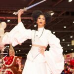 Tia Kofi Instagram - Drag Con UK Day One 👑 An incredible day I will always remember at @rupaulsdragcon! The new cast of Drag Race UK versus the World was officially announced. Swipe to see my reaction after the announcement 😇 Look by @mrmakonam Hair by @styledbyvodka Lightsaber by me rhinestoning for a week while watching Line of Duty on @bbciplayer #DragRace #DragRaceUK #ukvstheworld Tatooine