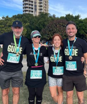 Tommy Little Instagram - This is my mate @annieyoungarts. I was stoked to be one of her guide runners today at the @gcmarathon. She achieved a 10kms PB and as you can see I was completely fine too and definitely not at all completely fucked by the end of it. Congrats Annie! ❤️