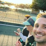 Tommy Little Instagram - This is my mate @annieyoungarts. I was stoked to be one of her guide runners today at the @gcmarathon. She achieved a 10kms PB and as you can see I was completely fine too and definitely not at all completely fucked by the end of it. Congrats Annie! ❤️