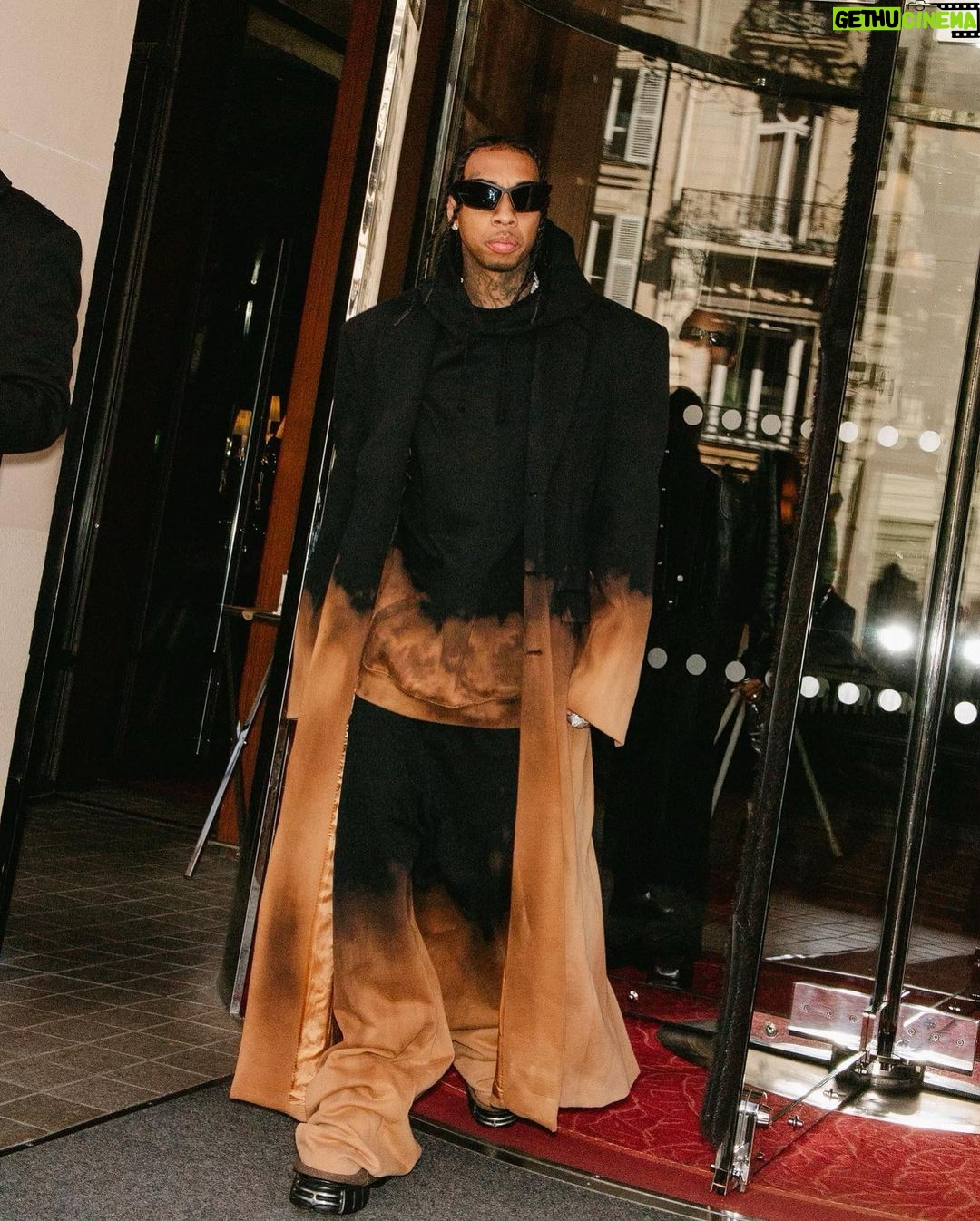 Tyga Instagram - When she got w u it was out of spite, I’m the black Superman u my kryptonite…married to the money throwin hunids like rice..