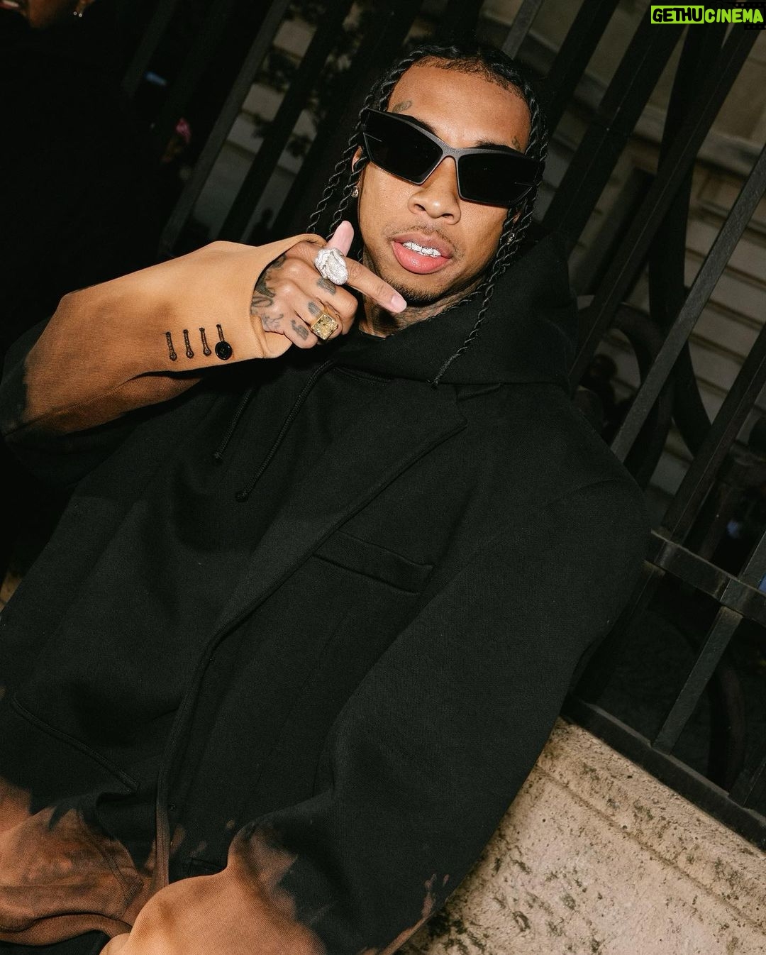 Tyga Instagram - When she got w u it was out of spite, I’m the black Superman u my kryptonite…married to the money throwin hunids like rice..