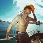 Tyga Instagram - Im Top gear shift w no fear Karats n ear, bugs bunny where? Blimp n air this a good year Like bad bunny this is my year Focused on the money, bish just sit here Like visine gotta make it crystal clear Thought we was kool..Til the bish got wierd So many stars n im still light years.
