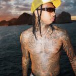 Tyga Instagram - Im Top gear shift w no fear Karats n ear, bugs bunny where? Blimp n air this a good year Like bad bunny this is my year Focused on the money, bish just sit here Like visine gotta make it crystal clear Thought we was kool..Til the bish got wierd So many stars n im still light years.