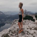 Valerie Huber Instagram – The obligatory on the edge mountain top kick pic 😂⛰️