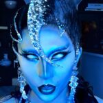 Vespi Instagram - Get ready with me for the Abyss 🧜‍♀️🪼 —— Masterpiece wig by @parizhair 🖤🩵💙 Lenses from @ttd_eye Pictures on my others post by @thefrenchbeautyboy And outfit by @gaia.imperial —— Using : * @nyxcosmetics_france Freezie primer * @makeupforever ultra HD stick fondation in Y225 * @mehronmakeup cream blend stick in blue and white * @nyxcosmetics_france sfx matte in must Sea * @makeupforever Star Lit powder * @nyxcosmetics_france lip lingerie in Naughty Noir * @ttd_eye blind white lenses ——- #dragrace #dragracefrance #rupaulsdragrace #teamvespi #teamvespiche #vespi #drag #dragqueen #rpdr Paris, France