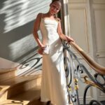 Victoria Beckham Instagram - I designed this exclusive Midi Cami Dress with #HarperSeven to wear at my #VBSS24 runway show in Paris!! I love the colour and how simple, yet elegant the silhouette is, paired with my Mini #VBChain. Kisses xx Shop the Exclusive Panelled Midi Cami Dress in Ivory now at VictoriaBeckham.com and at 36 Dover Street.