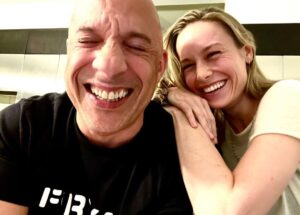 Vin Diesel Instagram - Yeah yeah yeah… you see this angel over my shoulder cracking me up, you say to your self “ that’s captain Marvel”. Clearly there is love and laughter in this image. What you don’t see however, is the character you will be introduced to in Fast10. You have no idea how timeless and amazing she will be in our mythology.  Beyond her beauty, her intellect… her Oscar, haha is this profound soul who will add something you might not have expected but yearned for. 
Welcome to the FAMILY Brie.
@brielarson