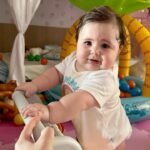 Vitória Moraes Instagram - Cada mês do meu ano ♥️ Comecei na barriga da mamãe e encerrei escalando e ficando em pé sozinha 🥹💜