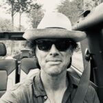 Walton Goggins Instagram - See that smile… I feel like I ate the canary. Just drove back from NYC. Got caught in a rainstorm. Pulled under a bridge. Left when it abated then drove straight into a bigger storm only this time there was no bridge. I got soaked, The car got soaked… everything got soaked. Listening to John Lennon the whole time. Didn’t even have to use a rag… the wind dried it. Now I’m on my dirt road. What a day this has been. Summer Upstate. Every day is something different. Gratitude I tell ya.