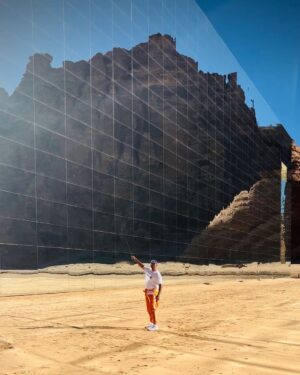 Will Smith Instagram - WOW. This was a whirlwind trip of 1sts. My first time to a camel race, my first time seeing the ancient remains of Hegra, my first time to the world’s largest mirrored building, then topping it off at F1! 
Thanx @therealswizzz, @saudibronx, @alulamoments, @lewishamilton, @mercedesamgf1, ’n @f1. #saudiarabiangp 📷: @jas
