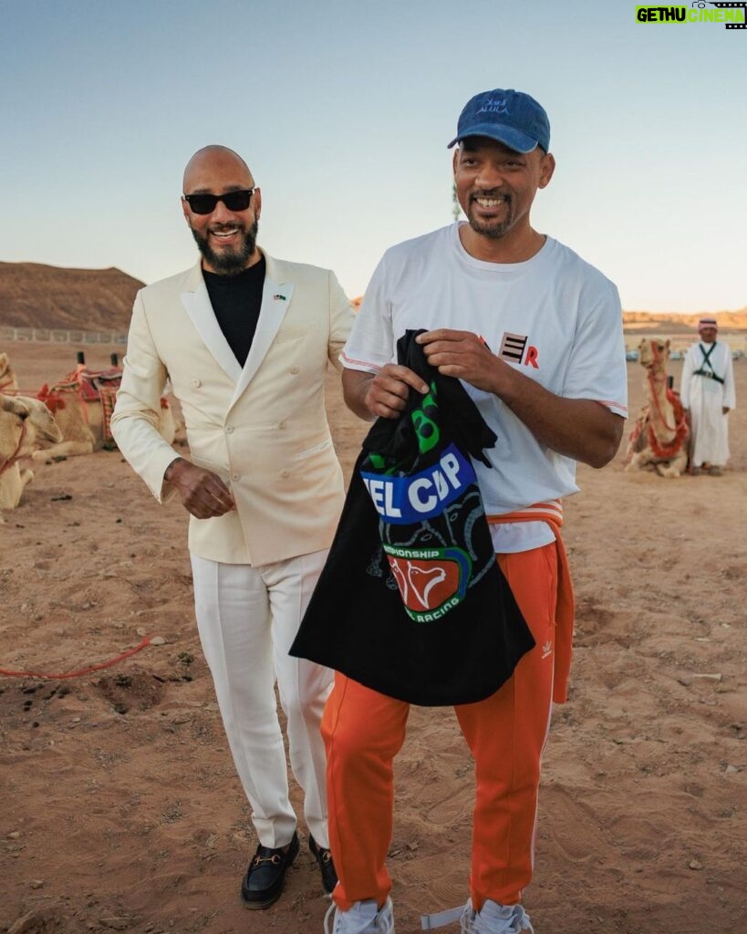 Will Smith Instagram - WOW. This was a whirlwind trip of 1sts. My first time to a camel race, my first time seeing the ancient remains of Hegra, my first time to the world’s largest mirrored building, then topping it off at F1! Thanx @therealswizzz, @saudibronx, @alulamoments, @lewishamilton, @mercedesamgf1, ’n @f1. #saudiarabiangp 📷: @jas