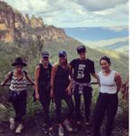 Yumi Stynes Instagram - A cup-filling weekend away in the Blue Mountains to celebrate @_sarahwilson_'s looming departure overseas 🥲 and cover more than 26km of genuinely challenging/ dangerous terrain, fall in mud, laugh deeply (all the way to my cervix) and bathe in pita bread. 1. The crew, the whole crew and nothing but the crew. 2. @_sarahwilson_ and our grumpy 15-year-old @jessmillersydney who sulked and kicked gravel and mumbled. 3. The view from our stunning digs @cloud.parade.leura 4. @timbrownmeditation made sure I didn't get left behind in the jungle 5. The ironically closed Wikileaks Cafe. Baffling. If you know, explain it to me. 6. Seriously, it's like Jurassic Park in there! 🦕 #BlueMountains 7. I'm filthy but @jeaninebribosia = immaculate. 8. The Ceremony of Giving. How does one gift to a minimalist? 9. Beverly the Doll and Shadow Beverly! 🪆 10. Yumi, Patti, Jeanine, Sarah and Jess. This was taken before any of us had gotten lost/exhausted/off-piste. How young and fresh-faced we were! 🤣