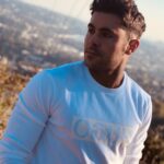 Zac Efron Instagram - “The meeting of two eternities, the past and future....is precisely the present moment.” - HDT #YourTimeIsNow #HugoMan #HUGOreversed