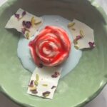 A. R. Rahman Instagram – Namaste New York. 

Our first dish is inspired by ROJA, in Tamil it means Rose or Sensitive. 
Our humble tribute to the first film – ROJA of maestro AR Rahman. @arrahman 

Candied Rose Petal Kulfi, Butterfly Pea Rabri, Kashmiri Rose & Pistachio Bark, Rose-Kewra Syrup. 

Timeless music to flavors of our heritage.

32 Days To Open @bungalowny New York, New York