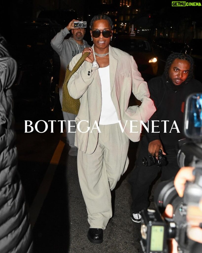 A$AP Rocky Instagram - FLACKO FOR BOTTEGA ‘24! THROUGHOUT HISTORY, THERE HAS ALWAYS BEEN A FUNNY RELATIONSHIP BETWEEN PHOTOGRAPHERS AND CELEBRITIES. EVEN DOWN TO THE RIGHTS AND THE USAGE OF PHOTOS, AND THE TABLOID HUSTLE, THERE’S ALWAYS SEEMED TO BE A DISCONNECTION BETWEEN FAMOUS PEOPLE AND THE PHOTOGRAPHERS WHO FOLLOW & FILM THEM. WHILE CERTAIN CELEBRITIES CALL PAPARAZZI ON THEMSELVES, OTHER CELEBRITIES MIGHT GET CONFRONTATIONAL WITH PHOTOGRAPHERS. WHILE A VERY SMALL FEW, SUCH AS MYSELF, DON’T MIND, AS LONG AS THEY POST THE GOOD ANGLES, OF COURSE. SO, IN GOOD LIGHT OF GOOD ANGLED PHOTOS, MYSELF AND THE CREATIVE MINDS @ #BOTTEGAVENETA THOUGHT IT WOULD BE GENIUS TO BRIDGE THAT GAP AND UTILIZE MY EVERY DAY LIFESTYLE TYPE OF PHOTOS TAKEN BY CANDID PHOTOGRAPHERS WHILE I DO MY EVERYDAY THING. SO THIS SERVES LESS AS A CAMPAIGN AND MORE AS A CREATIVE TRIFECTA BROUGHT TO YOU BY BOTTEGA VENETTA’S MATTHIEU BLAZY, MYSELF A$AP ROCKY, AND THE TALENTED TABLOID STYLE PHOTOGRAPHERS INVOLVED. CHEERS & THANK U