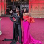 AJ Odudu Instagram - Pringles, fake candles… fashion darlings 🕯️💃🏿✨ Royal Albert Hall