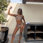 AJ Odudu Instagram – Hola! 💛 I’m lucky to have dodged a few wintery weeks, but to keep my skin hydrated when I return to the cold UK I’ll be covering myself in the new Delícia Drench Body Butter from @SoldeJaneiro 🌴💛

It locks in moisture for 24-hours and even nourishes our skin’s microbiome, giving that all-over sunshine glow whether we’re home or away. 😎🏡

It smells AMAZING and even has a brand new Cheirosa 59 Perfume Mist to match, giving the sweet scent of a holiday in a bottle. Love it! 💜 #ad