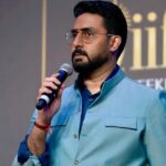 Abhishek Bachchan Instagram - Getting into the groove of #IIFA2023 with the talented @vickykaushal09. Looking forward to hosting and entertaining all of you. My friend @osmanabdulrazak , I hope I carried off the clothes well? Not half as cool as you, but I tried. 🫣