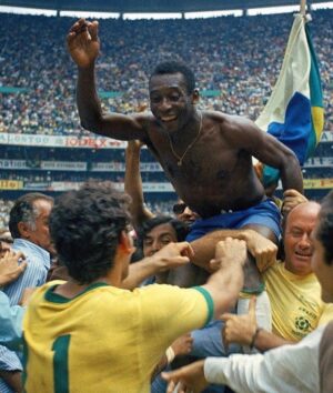 Abhishek Bachchan Instagram - As a child my father introduced me to Pelé and his magic. And thus began a lifelong love for football. We had shelves filled with VHS tapes of his and the Brazilian team’s matches. I would religiously watch them with my father. A magician we’ve all been blessed to witness. 
 A few years ago, whilst visiting India I somehow managed to get an autographed jersey of his. It has pride of placement in my office. 
Thank you, sir for teaching us about joga bonito and being such a hero and idol to billions. Rest in Peace to the greatest! @pele