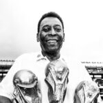 Abhishek Bachchan Instagram - As a child my father introduced me to Pelé and his magic. And thus began a lifelong love for football. We had shelves filled with VHS tapes of his and the Brazilian team’s matches. I would religiously watch them with my father. A magician we’ve all been blessed to witness. A few years ago, whilst visiting India I somehow managed to get an autographed jersey of his. It has pride of placement in my office. Thank you, sir for teaching us about joga bonito and being such a hero and idol to billions. Rest in Peace to the greatest! @pele