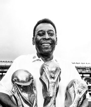 Abhishek Bachchan Instagram - As a child my father introduced me to Pelé and his magic. And thus began a lifelong love for football. We had shelves filled with VHS tapes of his and the Brazilian team’s matches. I would religiously watch them with my father. A magician we’ve all been blessed to witness. 
 A few years ago, whilst visiting India I somehow managed to get an autographed jersey of his. It has pride of placement in my office. 
Thank you, sir for teaching us about joga bonito and being such a hero and idol to billions. Rest in Peace to the greatest! @pele