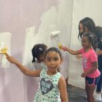 Aché Abrahams Instagram - Yesterday our community came together for the final push to clean and renovate the homework centre which we’re aiming to have re-opened by the end of the month. It warms my heart to see the children of La Seiva Village so excited and so involved ☺️. This is where I grew up and I remember how much of a positive impact the homework centre had on me as a child so I’m proud to say that @invisiblescarsproject_mwtt is sponsoring the financing for the infrastructure and renovations to get these doors open for the children of our community. Thank you to my beautiful community, my family and loved ones for coming together to make this possible! Every child deserves an opportunity to have a safe space and support system to help them achieve their aspirations in life. Here in T&T we have a famous saying, “it takes a village to raise a child,” so let’s get back to that ethos ❤️🙏🏽 #missworld #beautywithapurpose #roadtomissworld #InvisibleScarsProject #missworldtrinidadandtobago Trinidad and Tobago