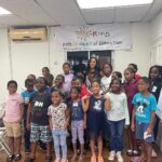 Aché Abrahams Instagram - Some more highlights from my mental health session with these incredible and sweet children from @kind_tt “catch up” summer camp 🥹❤️. So happy I get to do what I love which is to make people smile, especially the young ones. Creating safe spaces to discuss mental health is a passion of mine so thanks so much to @kind_tt for allowing me to be your youth mental health ambassador and to continue pushing my beauty with a purpose project @invisiblescarsproject_mwtt to all children who just want to feel safe and loved. Let’s continue to empower and transform as many lives as we can and please remember to be kind! 💚 #missworld #beautywithapurpose #roadtomissworld #InvisibleScarsProject #missworldtrinidadandtobago Trinidad and Tobago