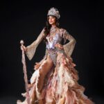 Aché Abrahams Instagram - Ole Time Something Come Back Again! ⚓✨ Thank you to Lost Tribe and the amazing @solangegovia for this masterpiece that made our Miss World Trinidad and Tobago, Aché Abrahams an absolute standout at the Miss World International Pageant! #Herstory behind the costume by Solange Govia: When I think of modern mas pioneers like Jason Griffith and bands like the Belmont Battalion, their different details to the unique dances that were born out of the the traditional King Sailor, I feel it’s important to commemorate the Golden Era of Sailor Mas portrayals: acknowledging the sophistication, vibrancy and power of this mas character. I also started thinking about being a woman in the Carnival industry, and the fact that is also my duty to always honour our womanhood in these sacred traditions. I always want my costumes to remind people that there will always be a place and space for female representation in mas, and I am grateful that Val allowed me this amazing creative opportunity to challenge my design instincts, to inject this sense of femininity and grace into this design, and to just create freely. From the embellished hat, to the towering collar, to the classic stick, I wanted to pay homage to the opulence that the Sailor Mas experience brings to the streets of Port of Spain. Of course, there had to be a design twist in this Fancy Sailor – the sand-coloured feathered skirt that replaced the bell-bottom pants, to not only represent the first visit of British, French and American naval ships in our nation’s history, but to also highlight where the Caribbean Sea meets the T&T shoreline. For me, it is this simple reminder that through every storm, women have become ‘the glue’ to the Carnival experience. We bring these powerful elements together to define our legacy, and we will always be pivotal in pushing the winds of change forward.” Photography : @raj.vphotography Costume : @solangegovia @carnivaltribe #missworld #LAVWAY #missworldtrinidadandtobago #SolangeGovia #fancysailor #history #designer #carnivaltt