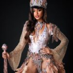 Aché Abrahams Instagram - Ole Time Something Come Back Again! ⚓✨ Thank you to Lost Tribe and the amazing @solangegovia for this masterpiece that made our Miss World Trinidad and Tobago, Aché Abrahams an absolute standout at the Miss World International Pageant! #Herstory behind the costume by Solange Govia: When I think of modern mas pioneers like Jason Griffith and bands like the Belmont Battalion, their different details to the unique dances that were born out of the the traditional King Sailor, I feel it’s important to commemorate the Golden Era of Sailor Mas portrayals: acknowledging the sophistication, vibrancy and power of this mas character. I also started thinking about being a woman in the Carnival industry, and the fact that is also my duty to always honour our womanhood in these sacred traditions. I always want my costumes to remind people that there will always be a place and space for female representation in mas, and I am grateful that Val allowed me this amazing creative opportunity to challenge my design instincts, to inject this sense of femininity and grace into this design, and to just create freely. From the embellished hat, to the towering collar, to the classic stick, I wanted to pay homage to the opulence that the Sailor Mas experience brings to the streets of Port of Spain. Of course, there had to be a design twist in this Fancy Sailor – the sand-coloured feathered skirt that replaced the bell-bottom pants, to not only represent the first visit of British, French and American naval ships in our nation’s history, but to also highlight where the Caribbean Sea meets the T&T shoreline. For me, it is this simple reminder that through every storm, women have become ‘the glue’ to the Carnival experience. We bring these powerful elements together to define our legacy, and we will always be pivotal in pushing the winds of change forward.” Photography : @raj.vphotography Costume : @solangegovia @carnivaltribe #missworld #LAVWAY #missworldtrinidadandtobago #SolangeGovia #fancysailor #history #designer #carnivaltt