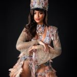Aché Abrahams Instagram - Ole Time Something Come Back Again! ⚓✨ Thank you to Lost Tribe and the amazing @solangegovia for this masterpiece that made our Miss World Trinidad and Tobago, Aché Abrahams an absolute standout at the Miss World International Pageant! #Herstory behind the costume by Solange Govia: When I think of modern mas pioneers like Jason Griffith and bands like the Belmont Battalion, their different details to the unique dances that were born out of the the traditional King Sailor, I feel it’s important to commemorate the Golden Era of Sailor Mas portrayals: acknowledging the sophistication, vibrancy and power of this mas character. I also started thinking about being a woman in the Carnival industry, and the fact that is also my duty to always honour our womanhood in these sacred traditions. I always want my costumes to remind people that there will always be a place and space for female representation in mas, and I am grateful that Val allowed me this amazing creative opportunity to challenge my design instincts, to inject this sense of femininity and grace into this design, and to just create freely. From the embellished hat, to the towering collar, to the classic stick, I wanted to pay homage to the opulence that the Sailor Mas experience brings to the streets of Port of Spain. Of course, there had to be a design twist in this Fancy Sailor – the sand-coloured feathered skirt that replaced the bell-bottom pants, to not only represent the first visit of British, French and American naval ships in our nation’s history, but to also highlight where the Caribbean Sea meets the T&T shoreline. For me, it is this simple reminder that through every storm, women have become ‘the glue’ to the Carnival experience. We bring these powerful elements together to define our legacy, and we will always be pivotal in pushing the winds of change forward.” Photography : @raj.vphotography Costume : @solangegovia @carnivaltribe #missworld #LAVWAY #missworldtrinidadandtobago #SolangeGovia #fancysailor #history #designer #carnivaltt