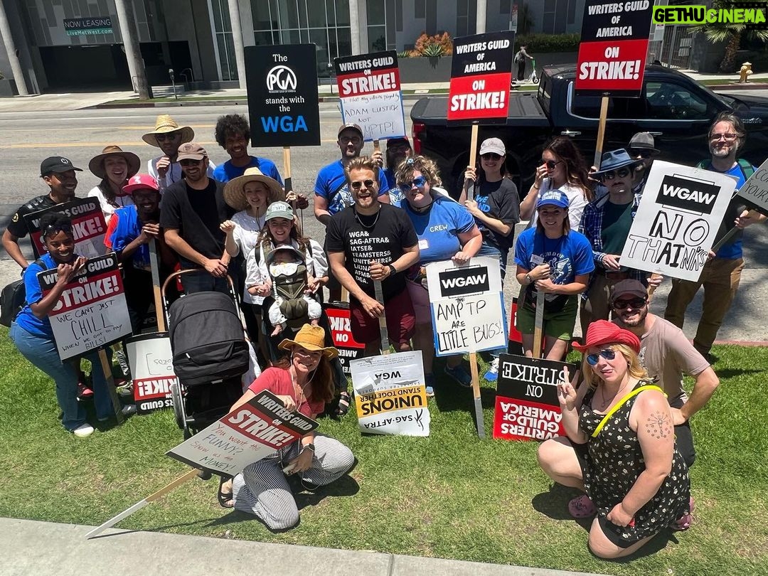 Adam Conover Instagram - What a joy to reunite with the Adam Ruins Everything and G Word creative staffs on the picket line this week and fight for our common needs. I owe everything to the creative people we made these shows. ALL of them deserve a union, and ALL of them deserve to be paid fairly. AMPTP is LITTLE BUGS!!! (Also, see if you can spot the lady who jumped into our group picture even though she didn’t work on the show) Los Angeles, California