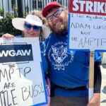 Adam Conover Instagram - What a joy to reunite with the Adam Ruins Everything and G Word creative staffs on the picket line this week and fight for our common needs. I owe everything to the creative people we made these shows. ALL of them deserve a union, and ALL of them deserve to be paid fairly. AMPTP is LITTLE BUGS!!! (Also, see if you can spot the lady who jumped into our group picture even though she didn’t work on the show) Los Angeles, California