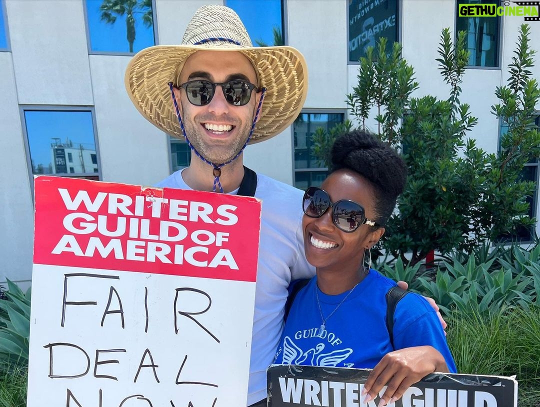 Adam Conover Instagram - What a joy to reunite with the Adam Ruins Everything and G Word creative staffs on the picket line this week and fight for our common needs. I owe everything to the creative people we made these shows. ALL of them deserve a union, and ALL of them deserve to be paid fairly. AMPTP is LITTLE BUGS!!! (Also, see if you can spot the lady who jumped into our group picture even though she didn’t work on the show) Los Angeles, California
