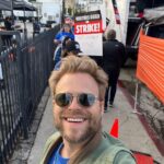 Adam Conover Instagram - We have a long way to go, but the first week was incredible. Marching with hundreds of writers and other union members. Rushing to a location to shut down a Marvel shoot. Unbelievable. Can’t wait to hit the lines again this week. Pace yourselves, everyone - we have to be in this for the long haul.