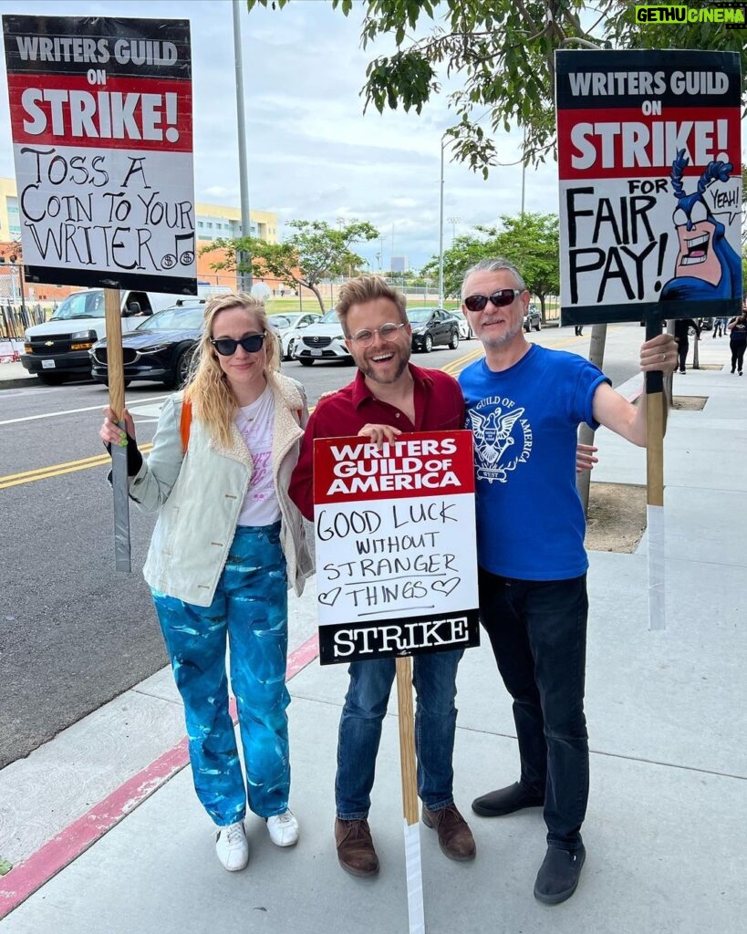 Adam Conover Instagram - Best part of picketing is meeting your heroes. This week I met Dolly at the Pride Picket (@supnebrasska), and Ben Edlund, creator of one of my favorite shows from my childhood. It was an amazing week 5 on the line - can’t wait for next week! Warner Brothers Studios - Burbank, CA
