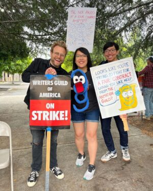 Adam Conover Instagram - Scenes from last week’s picketing. So inspiring to have so many workers from other unions (@animationguild! @iatse!) and local businesses giving us support. ❤️🪧❤️