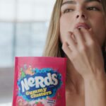 Addison Rae Instagram - Guess who I’m coaching…?! 🪩🕺🕺🎶🍬  tune in to find out!! @nerdscandy 2.11 #ad