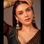 Aditi Rao Hydari Instagram - The little black dot! I never wanted to wear a bottu (that’s what a bindi is called in Hyderabad) when I was little. It’s so much a part of the southern indian tradition, it doesn’t even count as dressing up. My mother wears a kumkum bottu made out of turmeric in the most beautiful vermillion, I used to watch her make her kumkum bottu, just that and she would glow without a spot of make up. I’d go to dance class and wear my neat middle parted long braid with no fuss but I just did not want to wear a bottu! It was years later when I started shooting for Kaatru veliyidai with mani sir that I got attached to this little black dot on my forehead. From the costume trials with Eka ( @ekalakhani) To shooting in Ooty, Ladakh , Serbia, the freezing cold, my Rudolph red nose and my little black bottu. And here it is! My favourite little black bottu @jigarmaliofficial @sanamratansi @tyaanijewellery @kaasastudio
