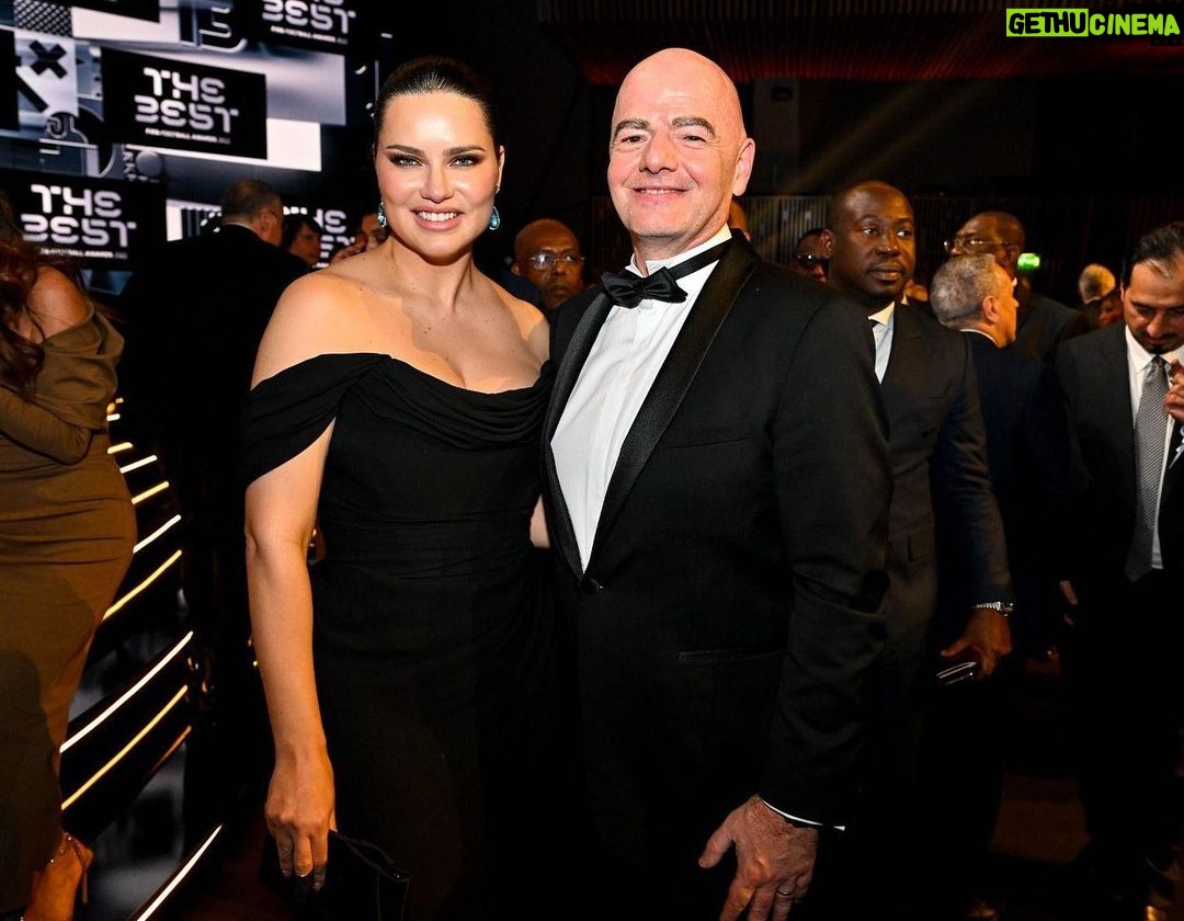 Adriana Lima Instagram - As a true “brasileira”, futebol is in my blood! It is a great honor to be part of the FIFA Family, the FIFAMILY as we call it! As a fan myself, I hope to connect at a greater level this family to the life of this beautiful sport: the fans! Welcome to FIFAN Como uma verdadeira brasileira, o futebol está no meu sangue! Eh uma grande honra fazer parte da família FIFA, a FIFAMILIA como dizemos! Como uma fã também, eu espero conectar em um nível maior essa família com o que da vida a esse lindo esporte: os fãs! Bem vindo ao FIFAN Dress: @viviennewestwood Earrings: @kallatijewelry Shoes: @giuseppezanotti Bag: @jimmychoo Styling: @stylememaeve Hair: @vincentdemoro Make Up: @minkimmakeup Photo: courtesy of @fifa Paris, France