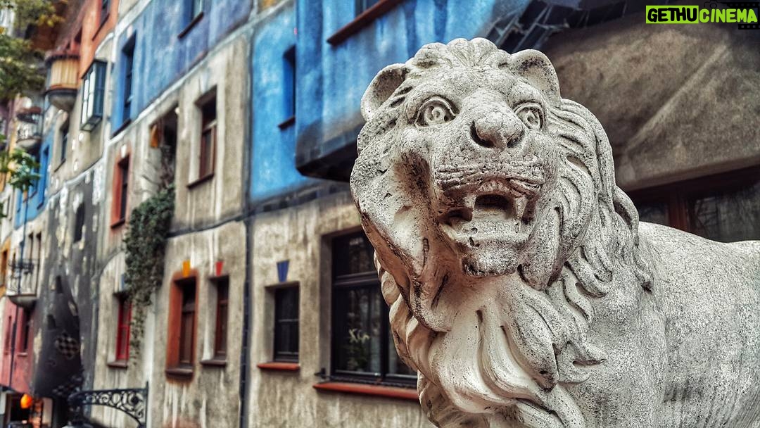 Ahmet Kürşat Öçalan Instagram - a #lion #statue & #hundertwasser #building in #vienna_city #vienna #wien #austria #beautifuldestinations