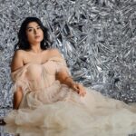 Akshita Bopaiah Instagram – Draped in glamour and wrapped in silver dreams. Channelling elegance in this beautiful mauve dress is @akshitha_bopaiah 

MUA – @nikithaanandmakeup 
Decor – @vakshaparivarah 
Outfit – @charny_mashi 
.
.
.
.
.
[Silver foil photoshoot, concept photoshoot, creative photoshoot ideas] One Horizon Productions