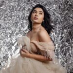 Akshita Bopaiah Instagram - Draped in glamour and wrapped in silver dreams. Channelling elegance in this beautiful mauve dress is @akshitha_bopaiah MUA - @nikithaanandmakeup Decor - @vakshaparivarah Outfit - @charny_mashi . . . . . [Silver foil photoshoot, concept photoshoot, creative photoshoot ideas] One Horizon Productions