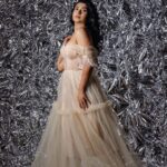Akshita Bopaiah Instagram - Draped in glamour and wrapped in silver dreams. Channelling elegance in this beautiful mauve dress is @akshitha_bopaiah MUA - @nikithaanandmakeup Decor - @vakshaparivarah Outfit - @charny_mashi . . . . . [Silver foil photoshoot, concept photoshoot, creative photoshoot ideas] One Horizon Productions