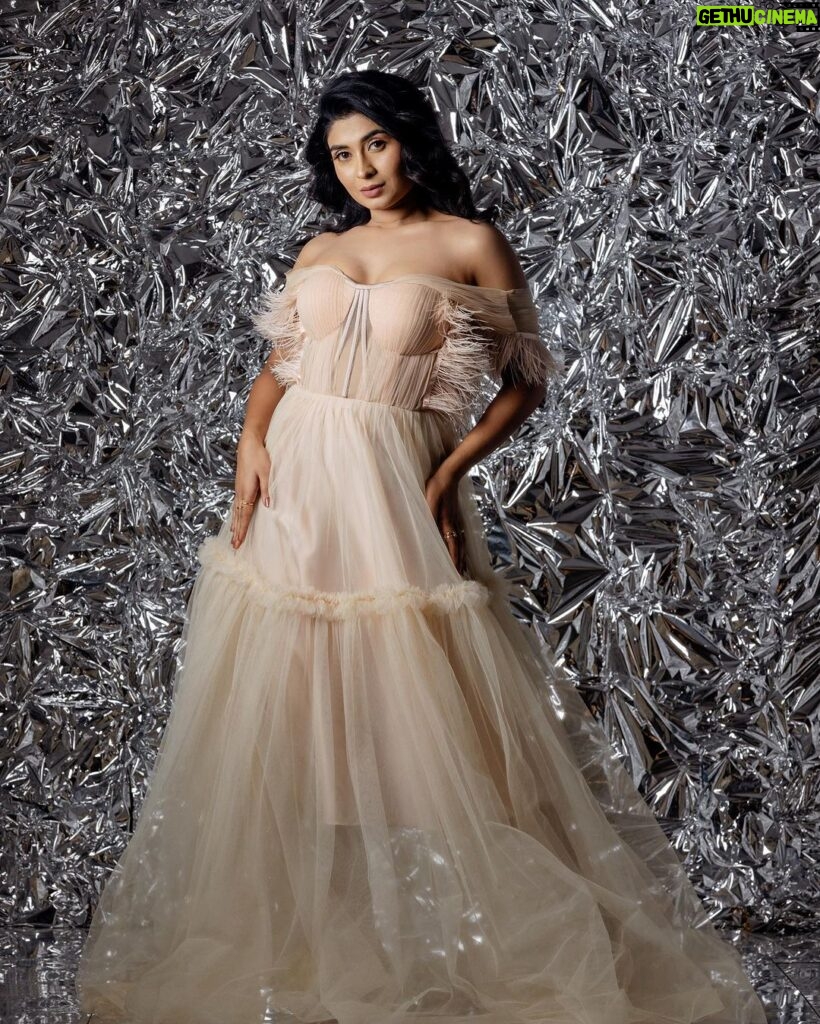 Akshita Bopaiah Instagram - Draped in glamour and wrapped in silver dreams. Channelling elegance in this beautiful mauve dress is @akshitha_bopaiah MUA - @nikithaanandmakeup Decor - @vakshaparivarah Outfit - @charny_mashi . . . . . [Silver foil photoshoot, concept photoshoot, creative photoshoot ideas] One Horizon Productions