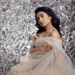 Akshita Bopaiah Instagram - Draped in glamour and wrapped in silver dreams. Channelling elegance in this beautiful mauve dress is @akshitha_bopaiah MUA - @nikithaanandmakeup Decor - @vakshaparivarah Outfit - @charny_mashi . . . . . [Silver foil photoshoot, concept photoshoot, creative photoshoot ideas] One Horizon Productions
